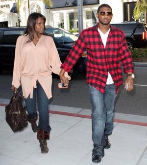Usher och hans fru ut på en promenad