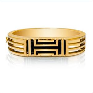 Pulsera con bisagras de metal de Tory Burch para Fitbit. 