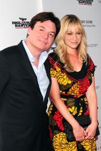 Mike Myers y Kelly Tisdale
